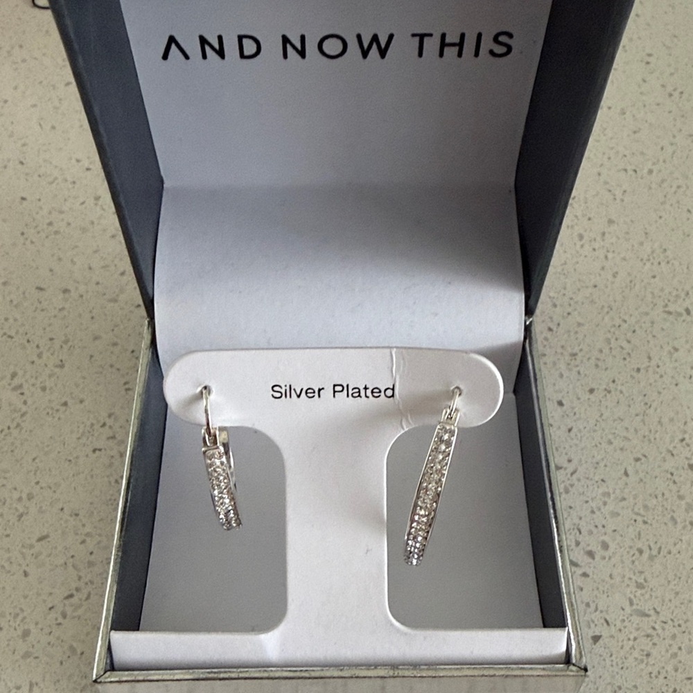And now this silver plated hoop earrings beautiful brand new